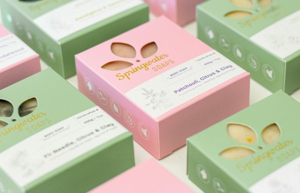 green and pink cardboard boxes